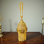 Royal Gold Embellished Bridal Potli with Tassel