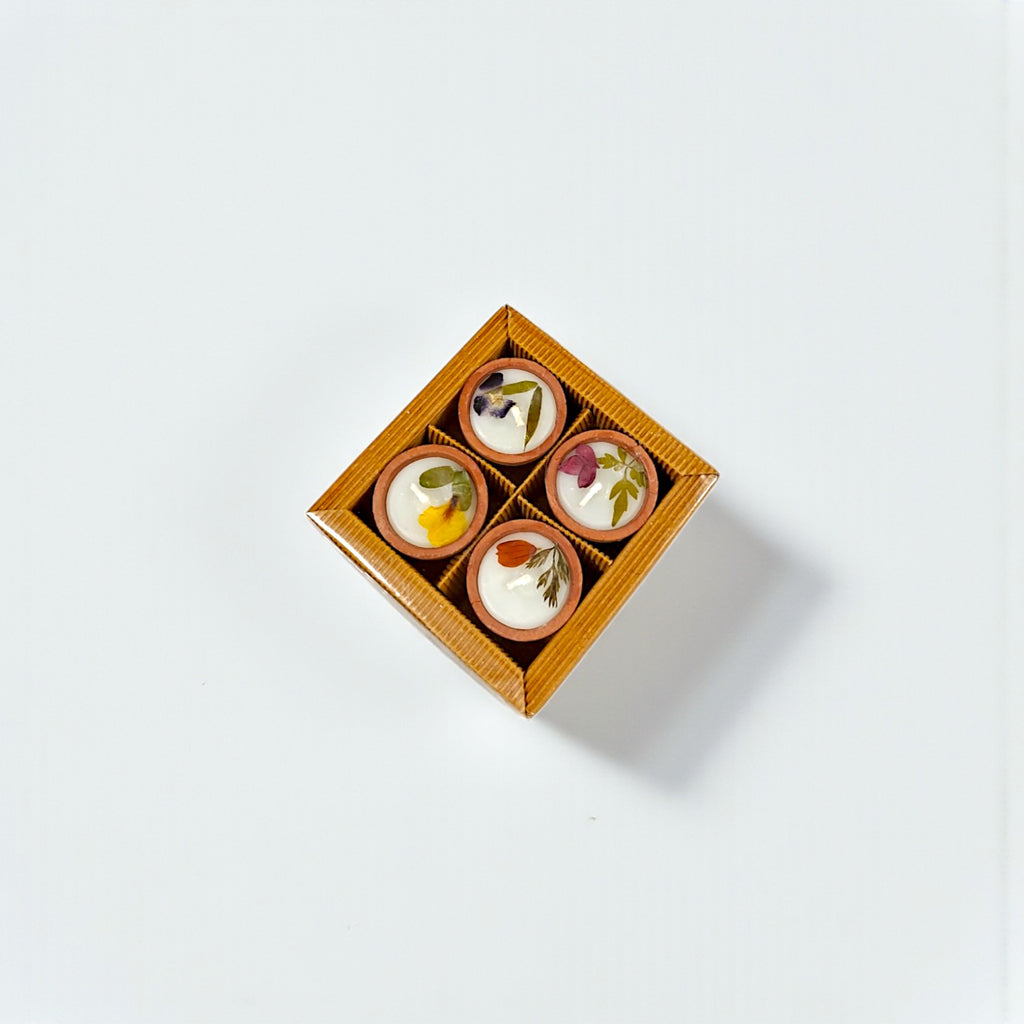 Handmade Aroma Candles with Natural Flower infused in terracotta Pot